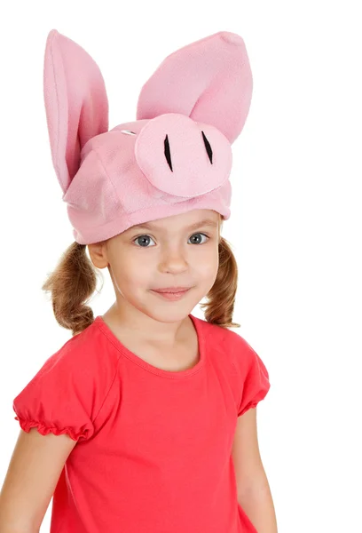 Malá holčička v klobouku veselá prasete. — Stock fotografie