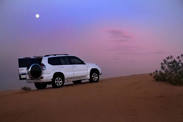 stock image SUV in the desert.