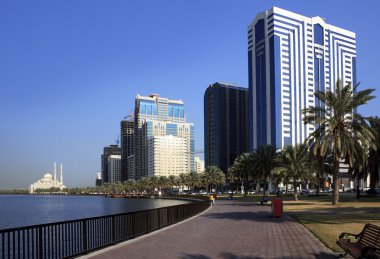 Skyscrapers in Sharjah. Khalid Lagoon.UAE. clipart