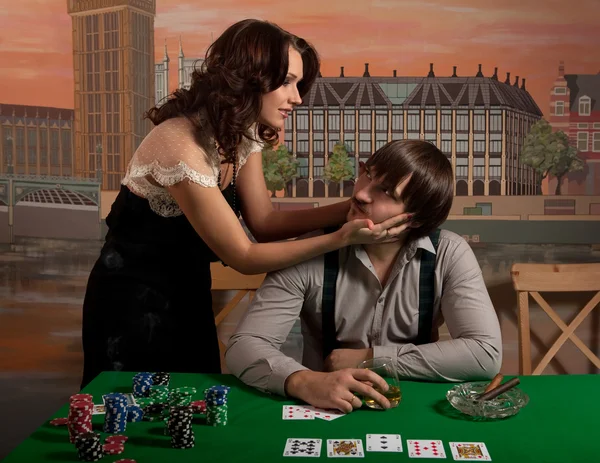 Wife persuades her husband to stop playing poker. — Stock Photo, Image