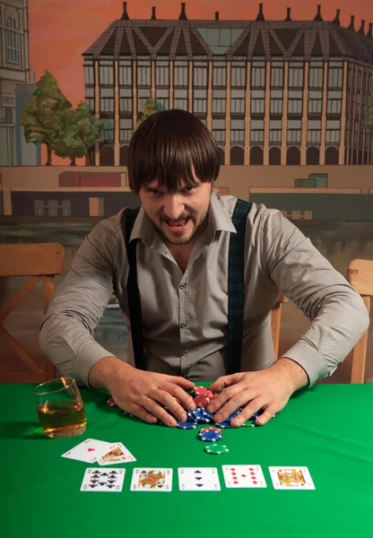 Poker player enjoys winning. — Stock Photo, Image