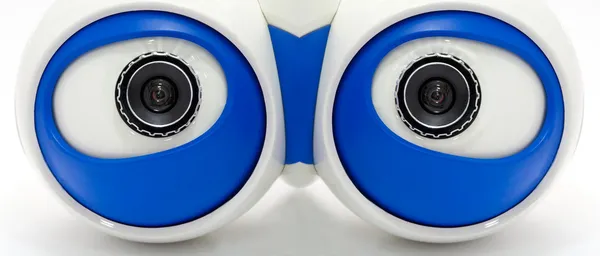 Ojos del robot. Un blanco ojos robóticos mirando —  Fotos de Stock