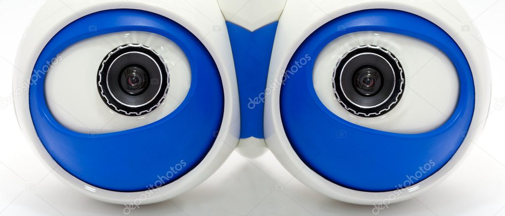 Eyes of the robot. A white robotic eyes looking