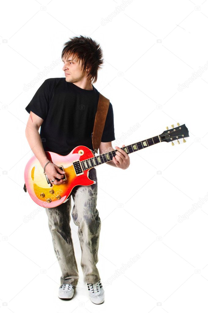 Rocker with electric guitar Stock Photo by ©DmitryPoch 150945594