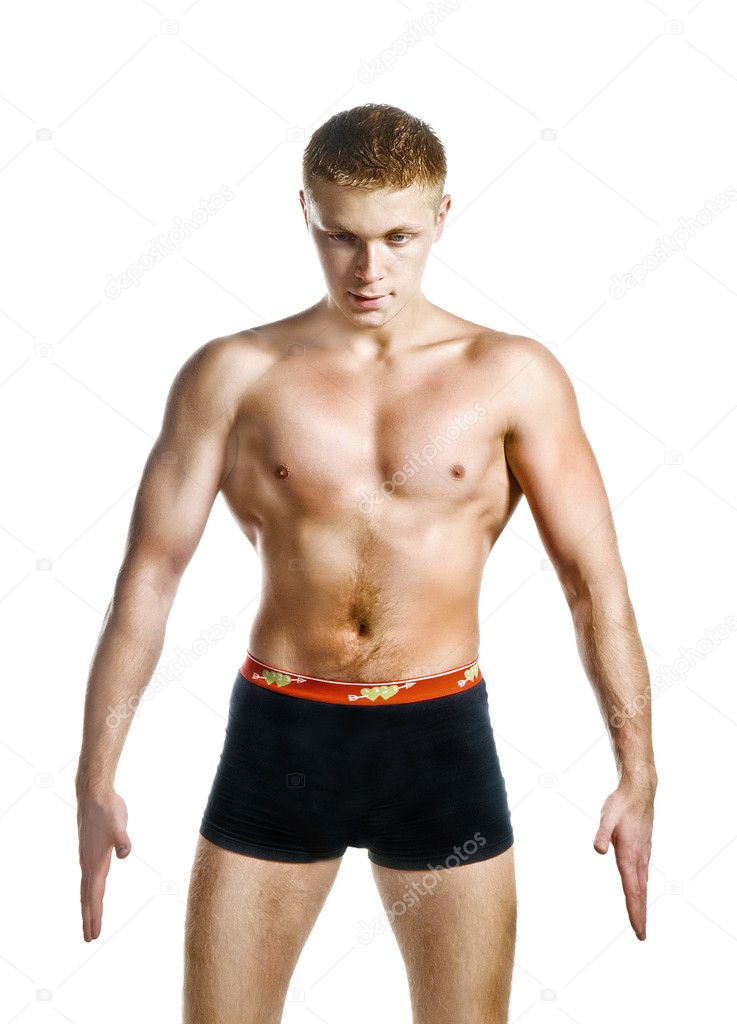 Shirtless bodybuilder posing