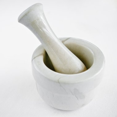 Classic stone mortar and pestle for spices clipart