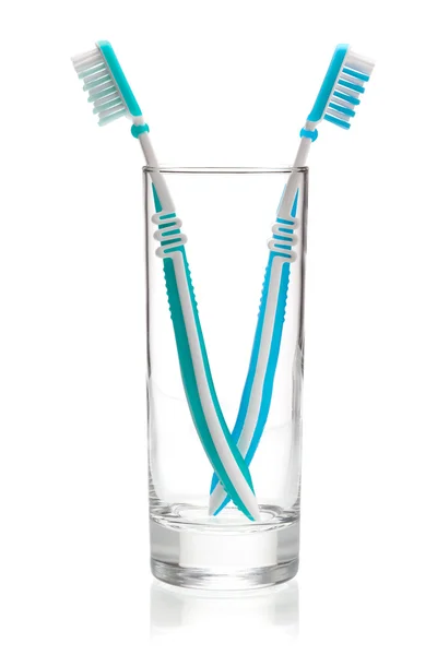 Duas escovas de dentes em vidro — Fotografia de Stock