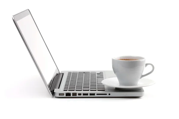 Cappuccino cup on laptop — Stock Photo, Image