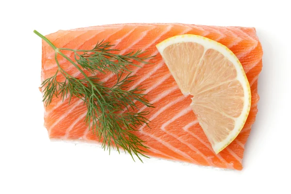 Pieza de salmón fresco con rodaja de limón y eneldo —  Fotos de Stock