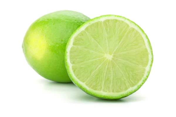 Whole and half lime — Stock Photo, Image