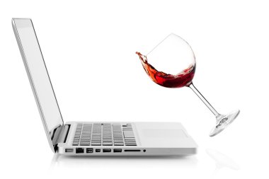 Wine falling on laptop clipart