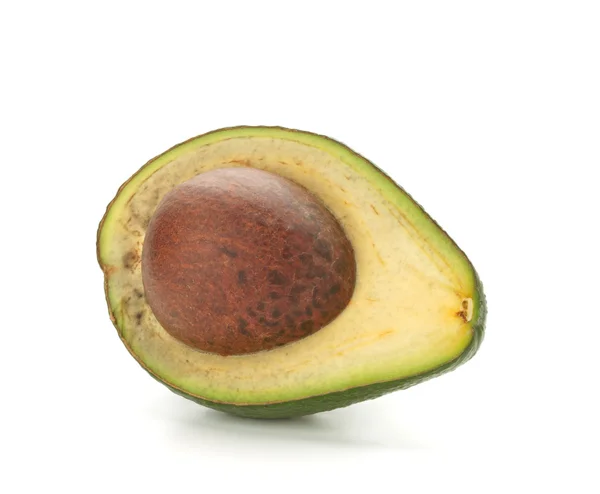 Половина авокадо с семенами — стоковое фото