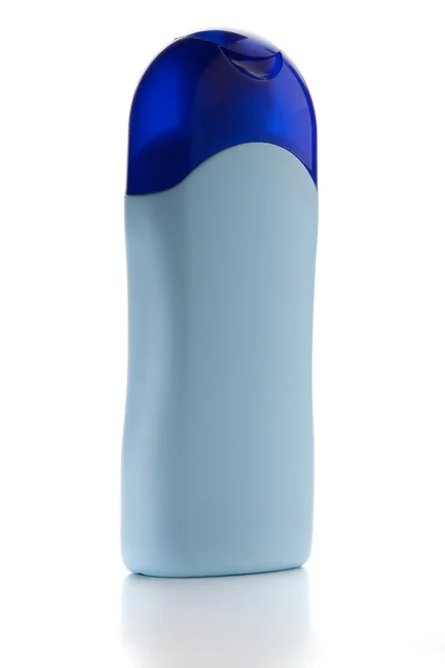 Голубая бутылка шампуня — стоковое фото