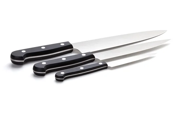 Три кухонных ножа — стоковое фото