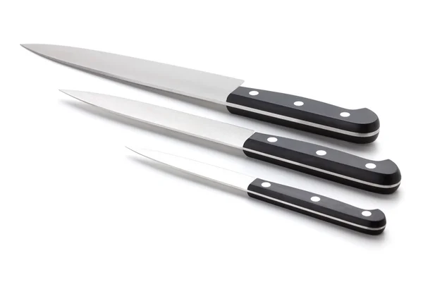 Три кухонных ножа — стоковое фото