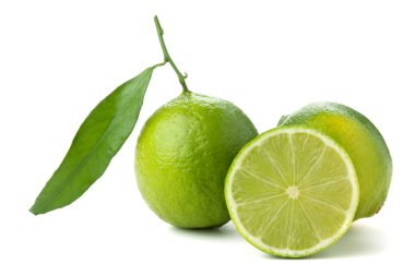 Fresh limes with green leaf clipart