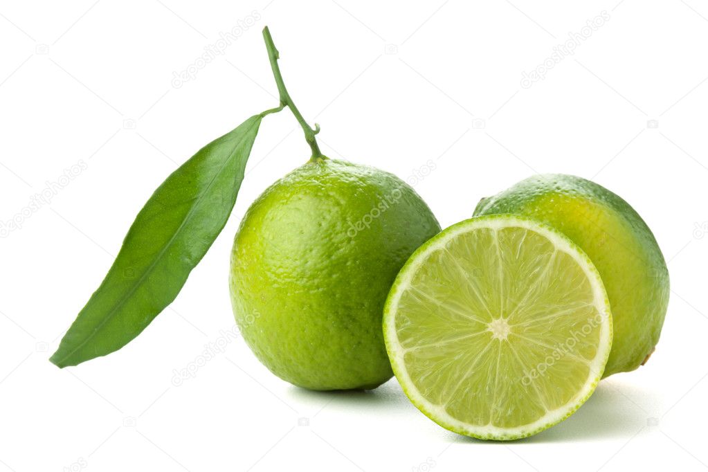 Fresh limes with green leaf