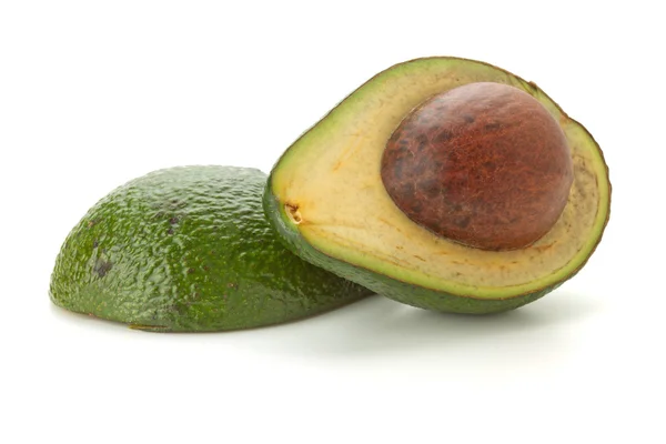 Дві половинки авокадо — стокове фото