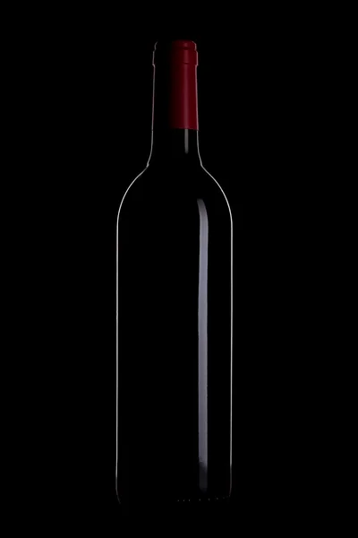 黒の背景にワインのボトルの概要 — ストック写真