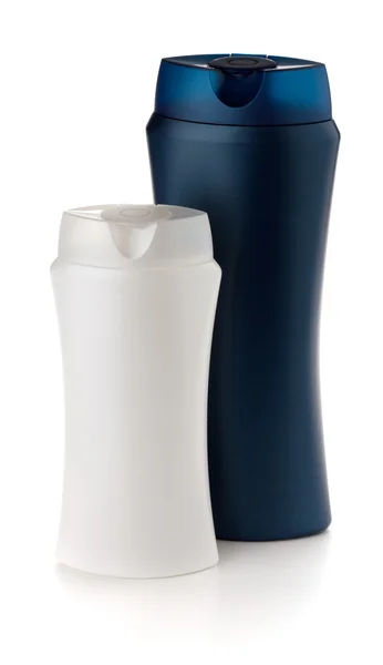 Weiße und blaue Shampoo-Flaschen — Stockfoto