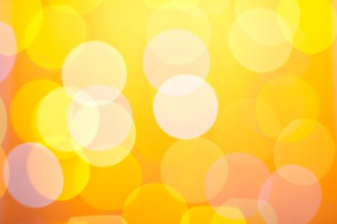 Abstract sunny bokeh on yellow clipart