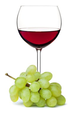 Red wine in glass with grape branch. Isolated on white background clipart