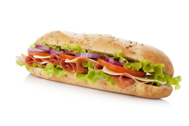 Long sandwich with ham, cheese, tomatoes, red onion and lettuce. Isolated on white clipart