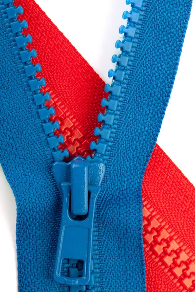 Blauwe en rode ritsen close-up — Stockfoto