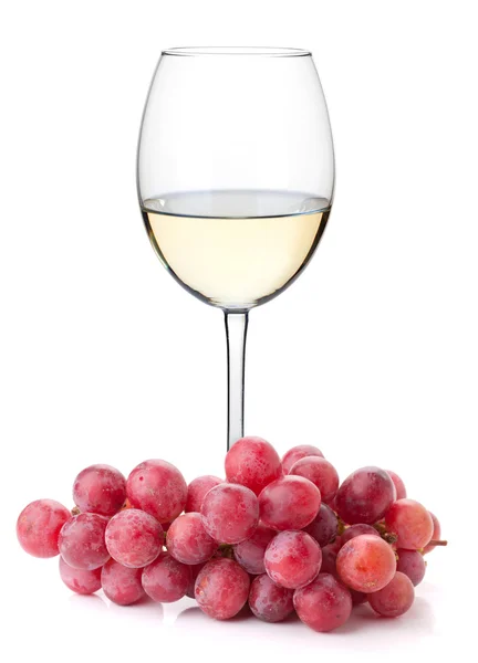 White wine glass with red grapes — Stock Photo, Image