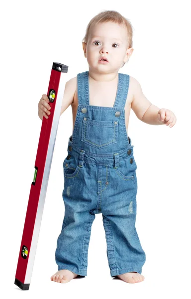 Small baby worker with level — Stock Photo, Image