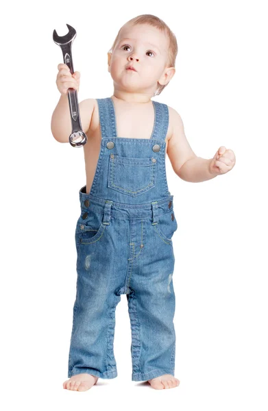Маленький дитячий працівник з гайковим ключем — стокове фото