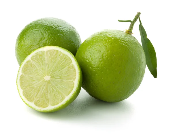Two and half ripe limes — Stock Photo, Image