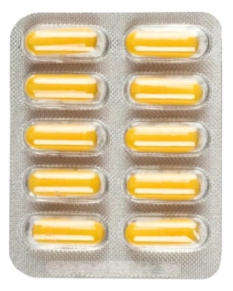 Balení pilulek izolovaných na bílém pozadí — Stock fotografie