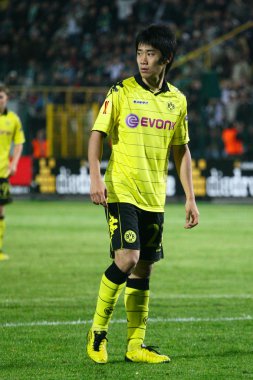 LVIV, UKRAINE - SEPTEMBER 16: FC Dortmund Borussia player Shinji clipart