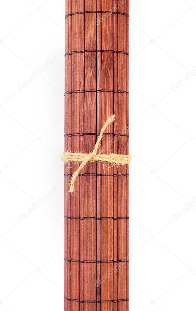 Rolled bamboo mat isolated on white background