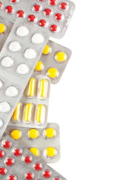 Gyógyszert tablettát elszigetelt fehér background — Stock Fotó