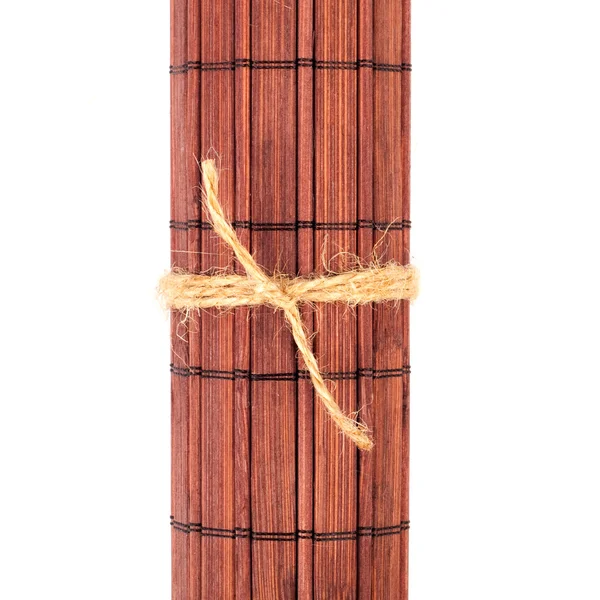 Varmvalsade bambu matta isolerad på vit bakgrund — Stockfoto