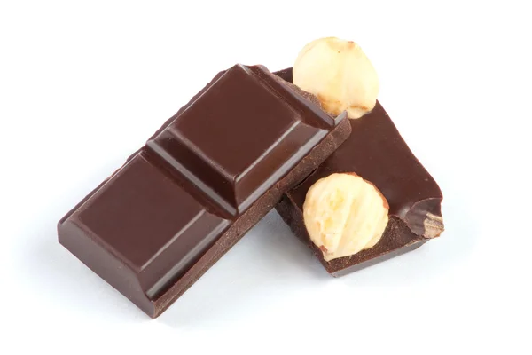 白で隔離されるナッツとチョコレート ・ バーの部分 — ストック写真