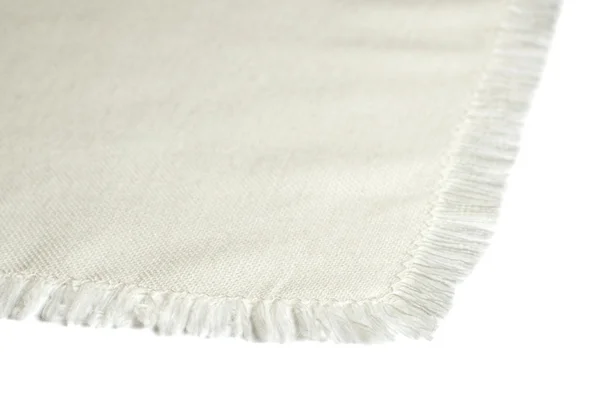 Close up of a white cotton napkin isolated on white background — Stock Photo, Image