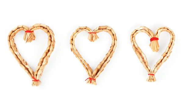 Christmas strawy decorative hearts isolated on white — Stock Photo, Image