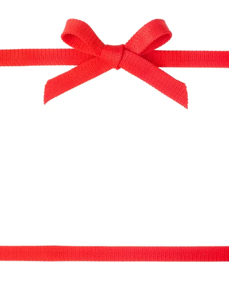 Red ribbon with a bow isolated on white background — Stock Photo, Image