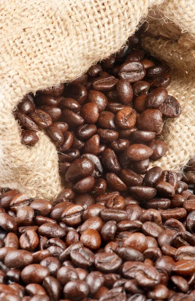 Coffee beans in a canvas sack — Stock Photo, Image