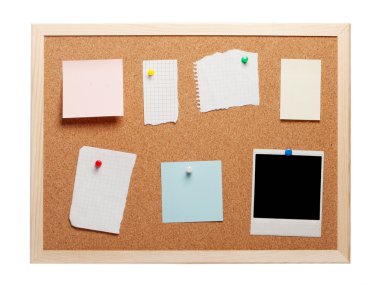 Blank instant photo and note papers on a cork board clipart