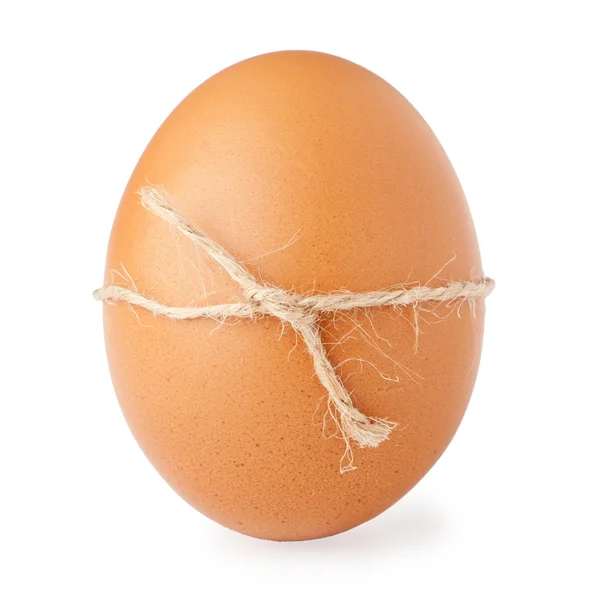 Huevo alineado con un cordel —  Fotos de Stock