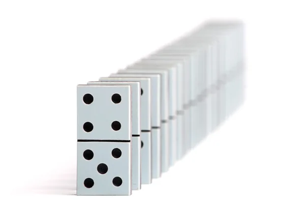 Dominosteine Einer Linie Auf Weißem Hintergrund — Stockfoto