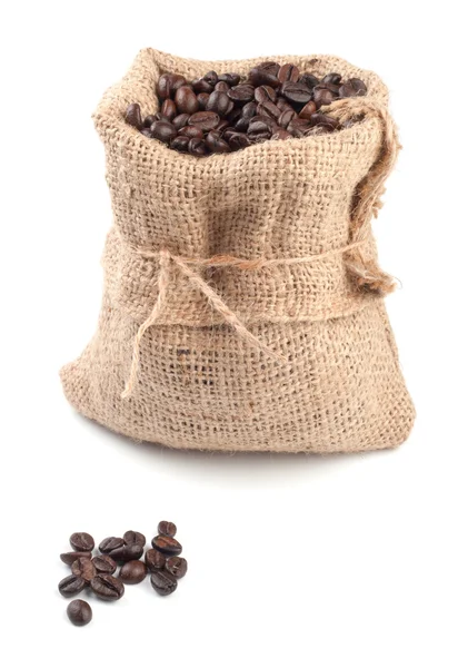 stock image Coffee beans in canvas sack on white background