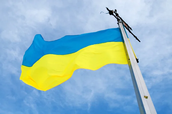 stock image Ukrainian flag against blue sky