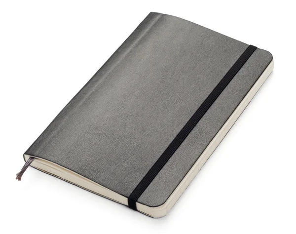 Caderno Moleskine preto sobre fundo branco — Fotografia de Stock