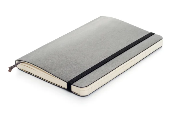 Czarny moleskine notebooka na białym tle — Zdjęcie stockowe