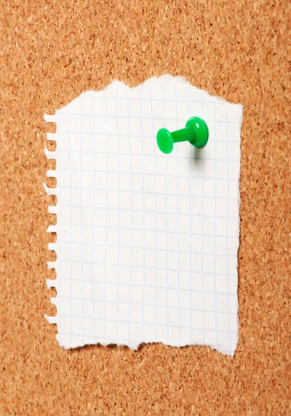 Piece of paper on a cork board close up — Stock Photo, Image